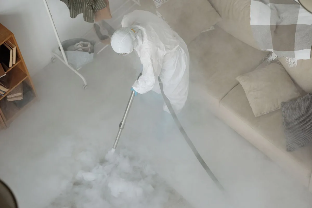 Biohazard cleanup technician in protective equipment, Irvington, NY